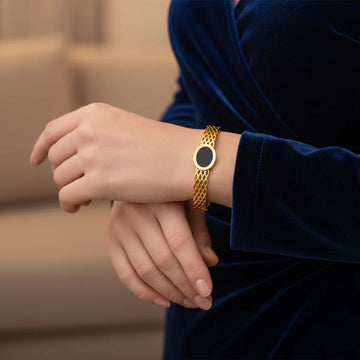 Gold-Plated Lattice Bangle with Black Enamel Disc