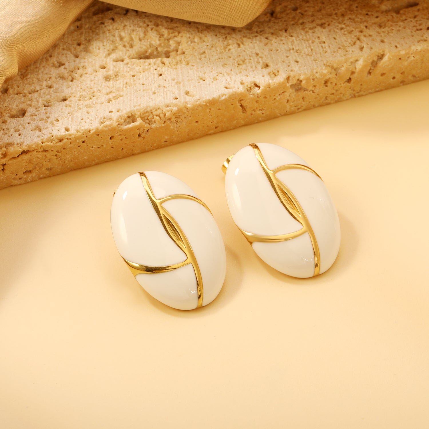 Gold-Trimmed White Enamel Oval Leaf Stud Earrings