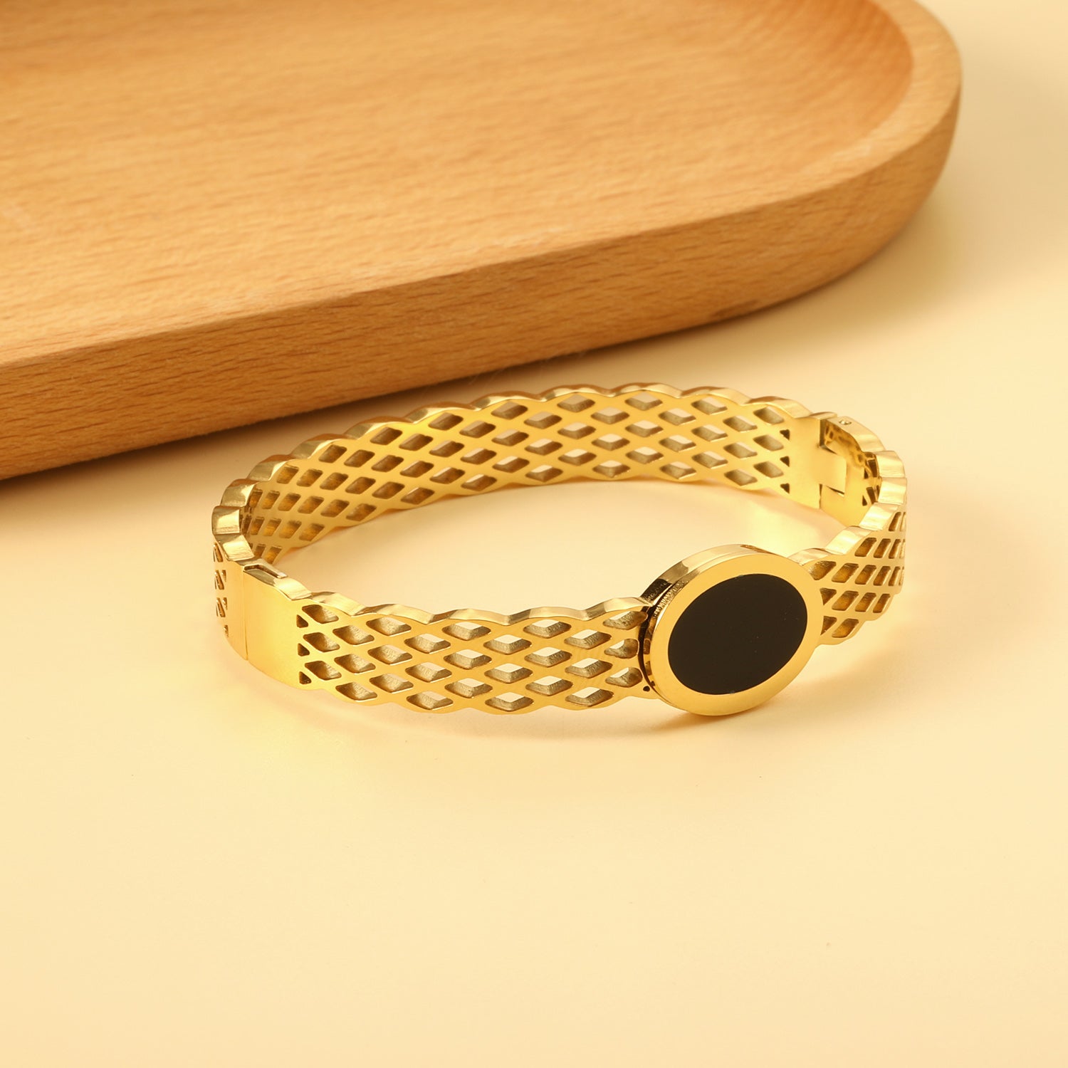 Gold-Plated Lattice Bangle with Black Enamel Disc
