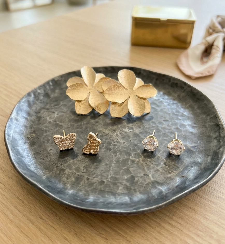 A Trio of Elegance: Tiered Earring Collection